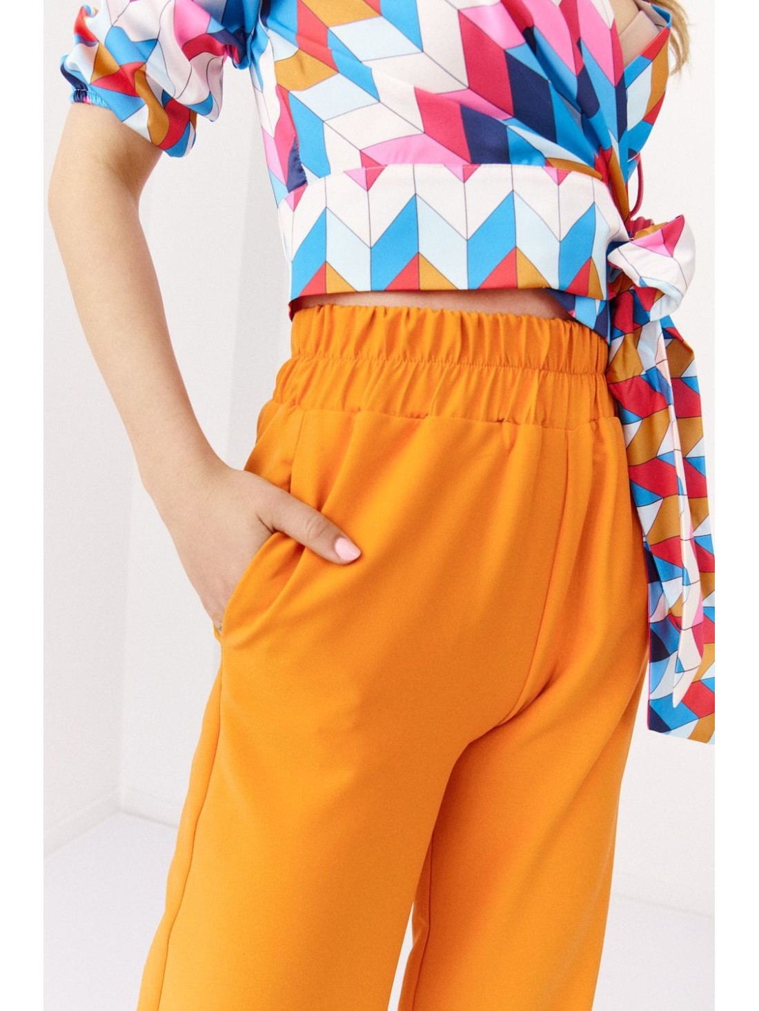 Wide trousers with elasticated pockets, orange 05036 - Online store - Boutique